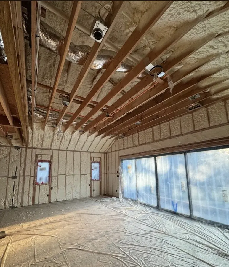 Interior walls and ceiling insulated with spray foam during new construction in Springdale