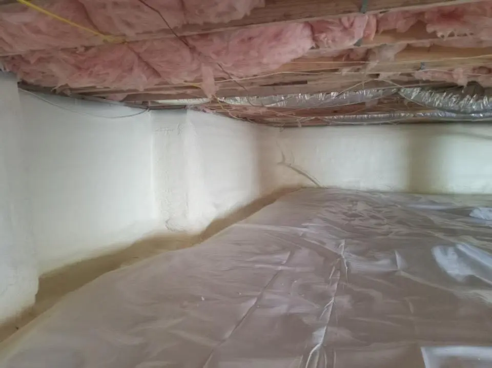 Crawl space encapsulation with closed-cell spray foam for Commercial Roof Restoration in Springdale